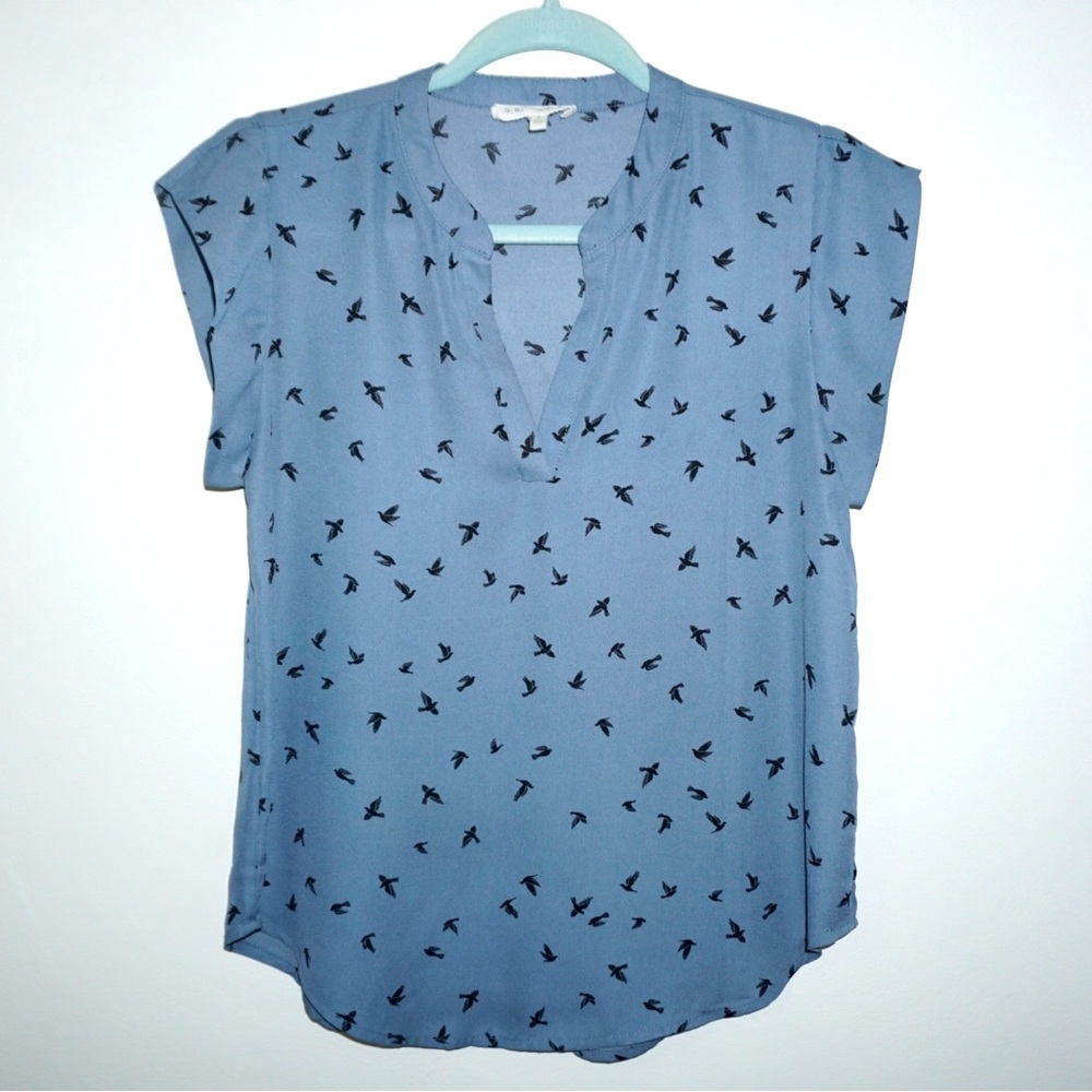 Blue short sleeve blouse shirt with black detail. V-neck. Size S.